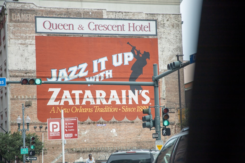 a large sign on the side of a building that says jazz it up with za