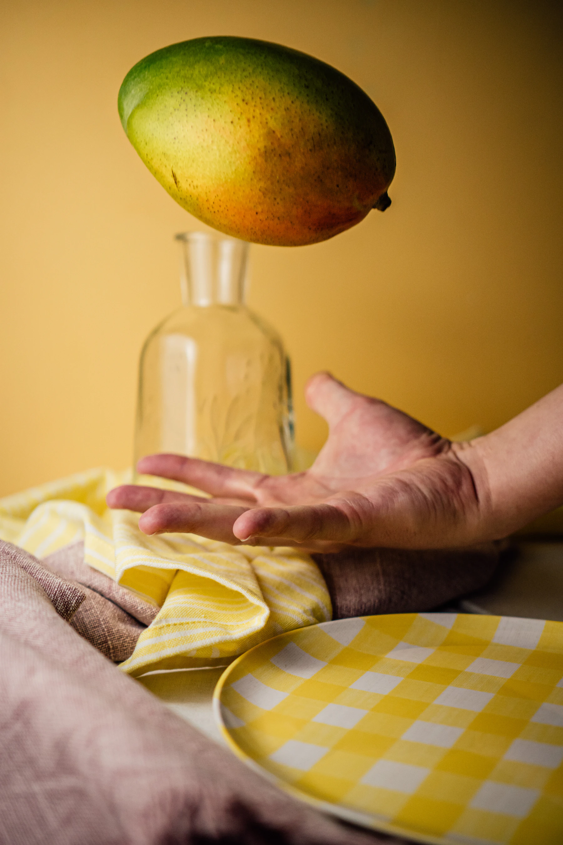 Fresh fruit preparation on a warm yellow background