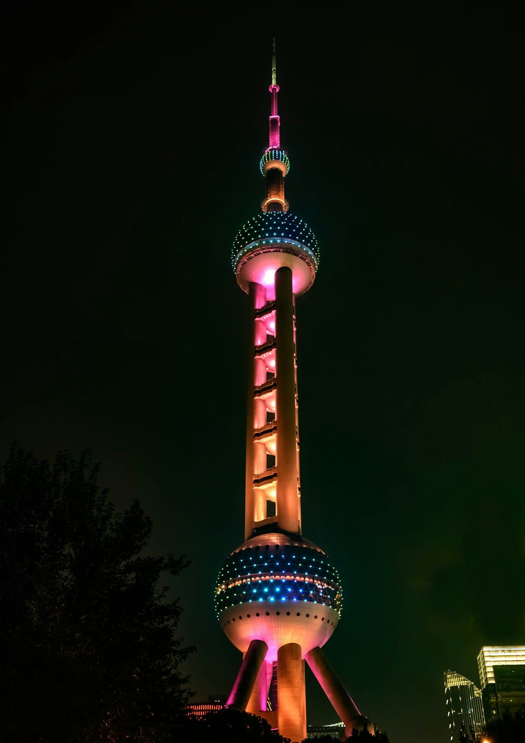 white and blue tower during night time