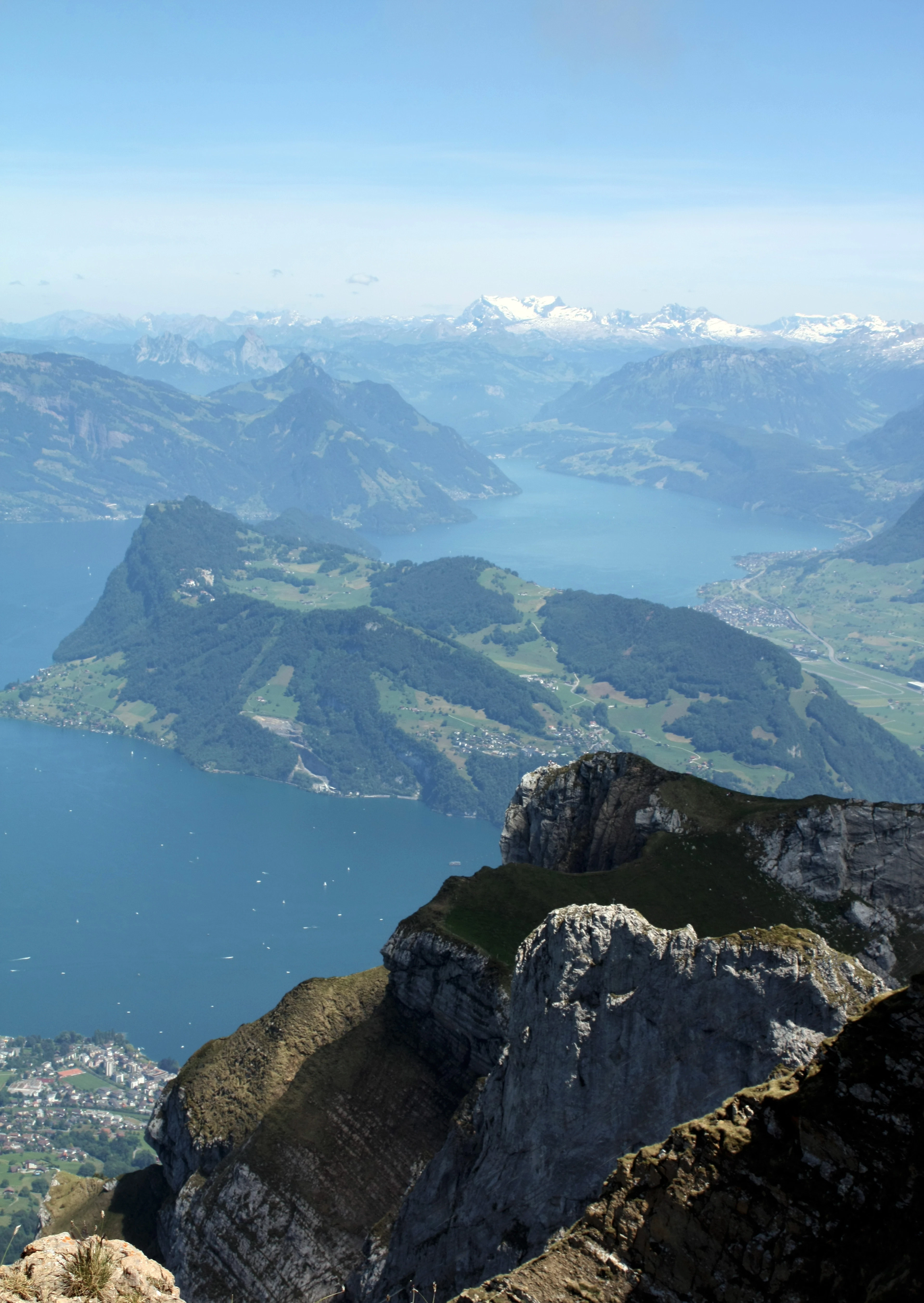 Looking down from Mount Pilatus over sheer cliffs to Lake Lucerne far below.