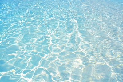 blue body of water during daytime pure google meet background