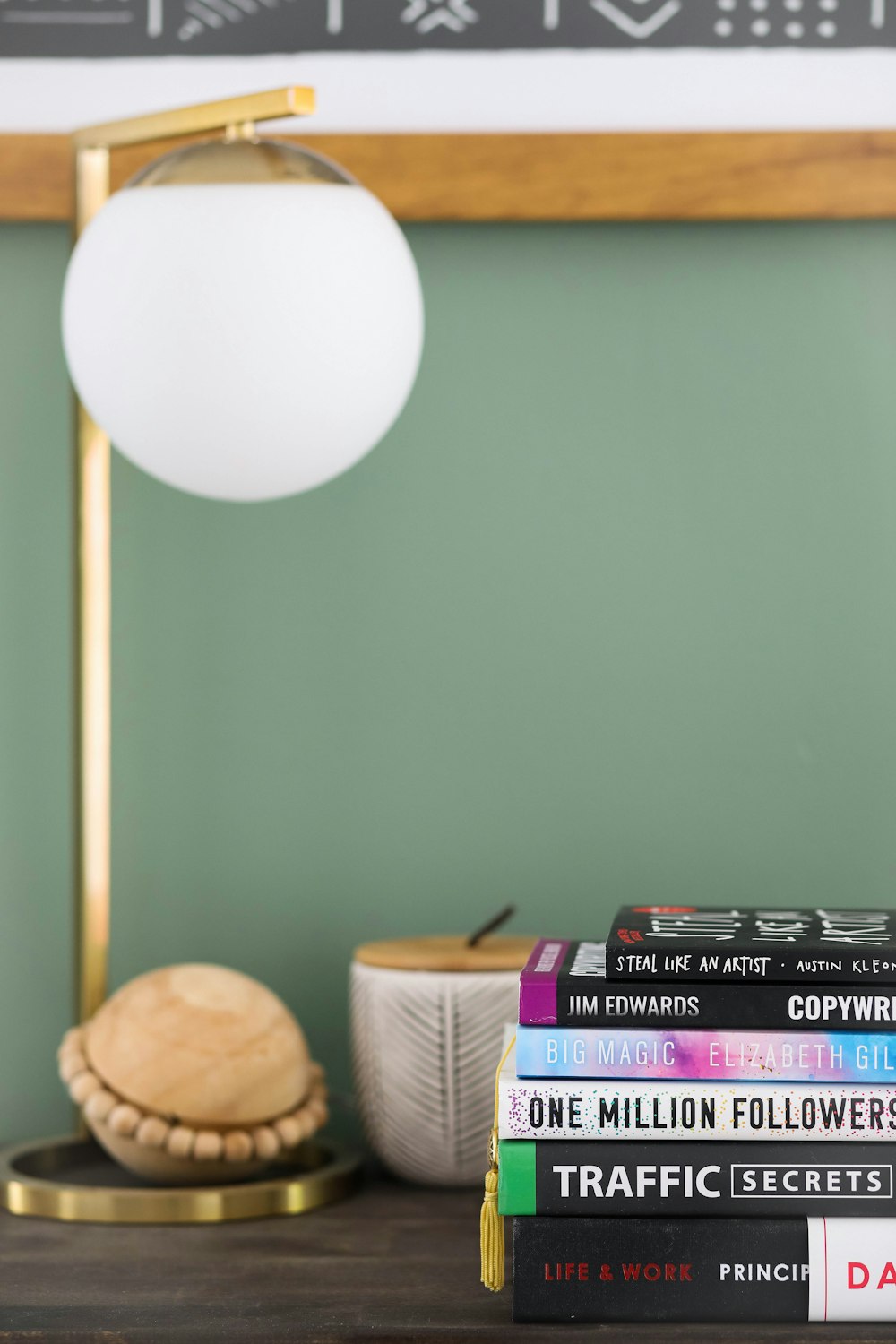 white round lamp near brown wicker basket