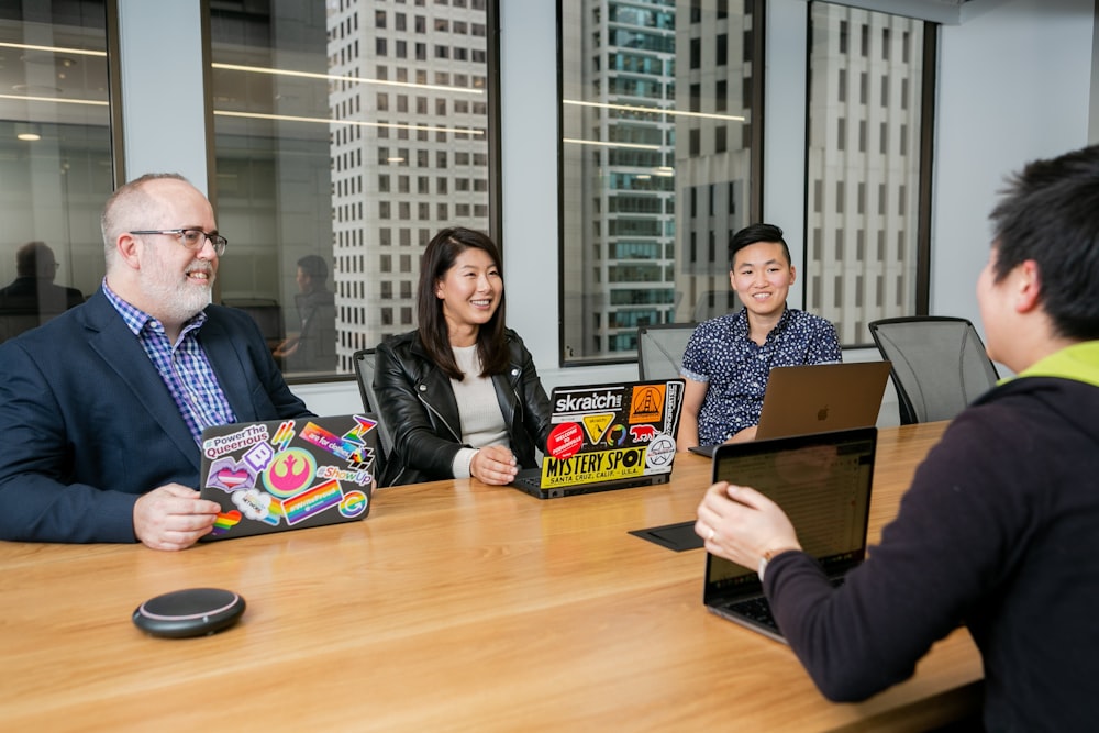 people in a design meeting in an office boardroom 