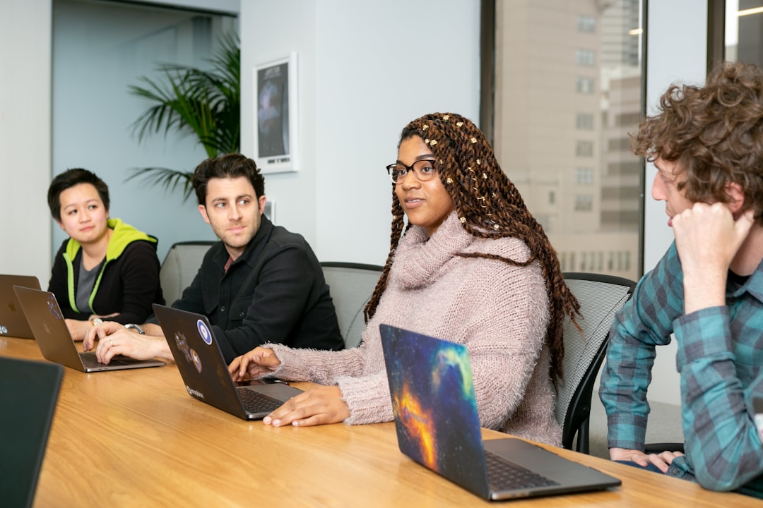 Employees streamlining the proposal development process through effective proposal management