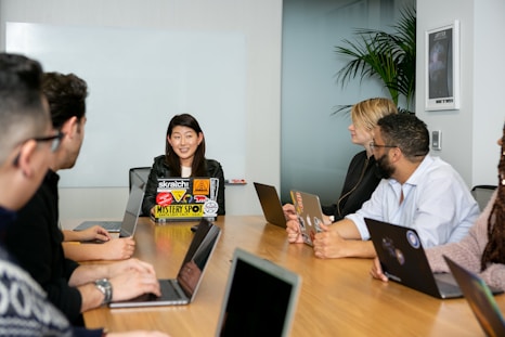 people in a meeting discussing app development