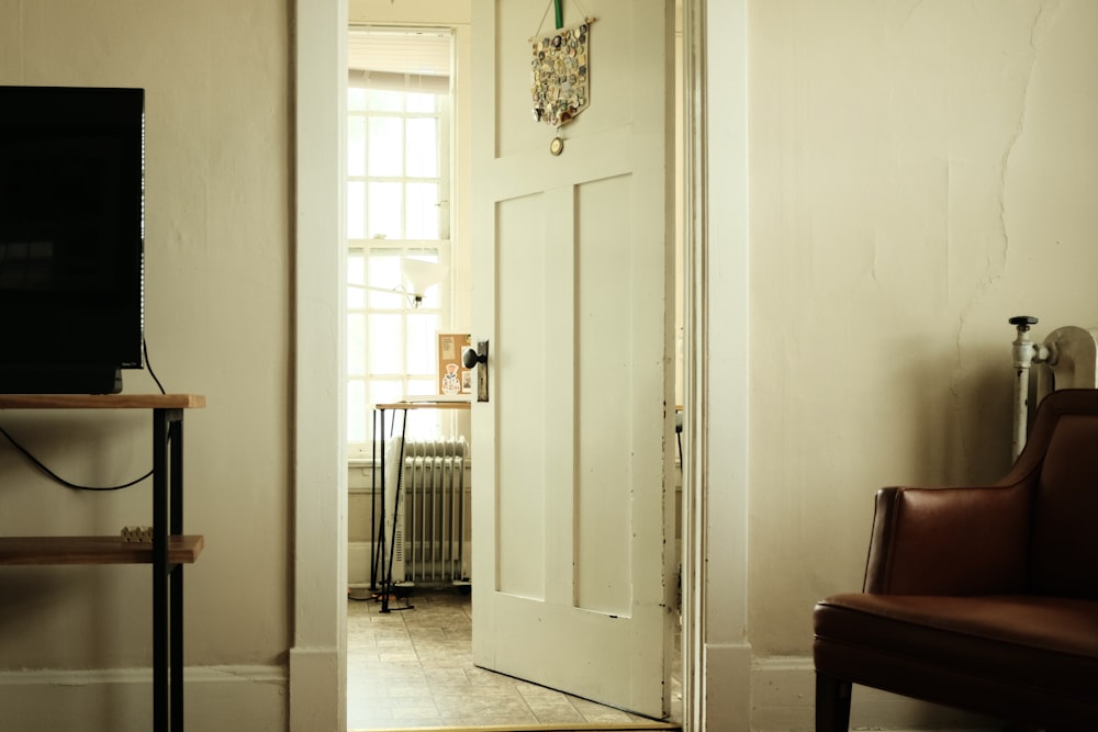 white wooden door near brown wooden table