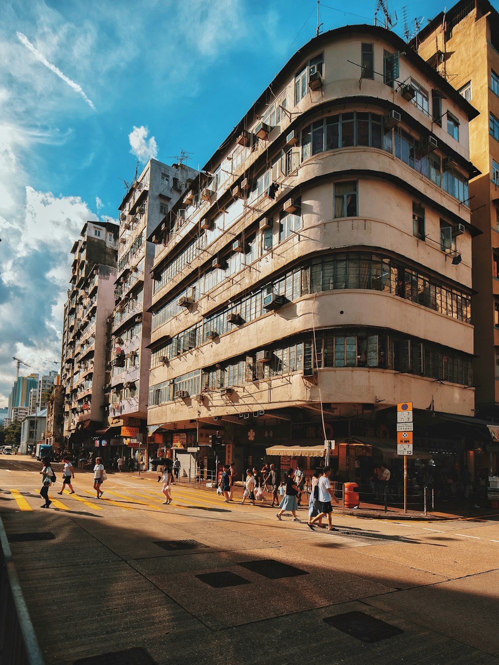 people walking on street near building during daytime