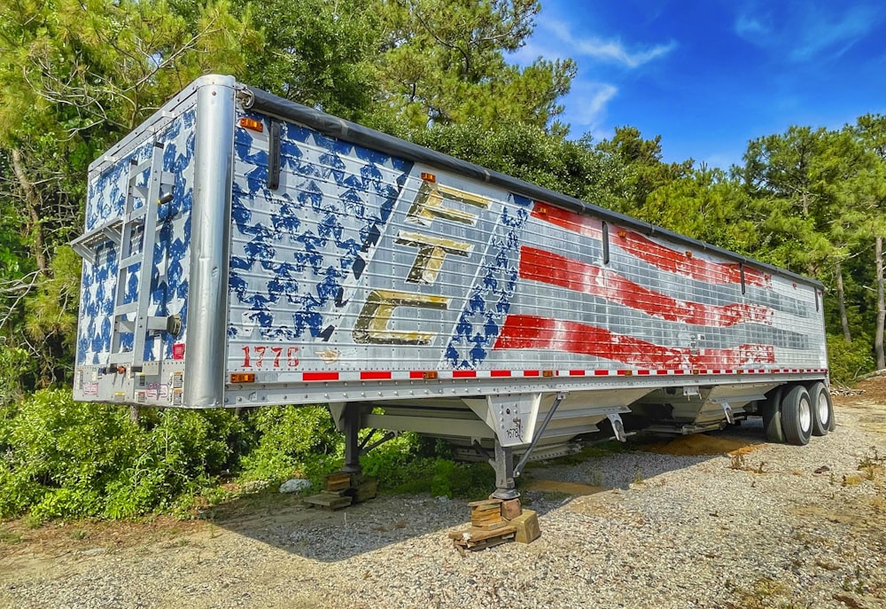 red and white trailer truck