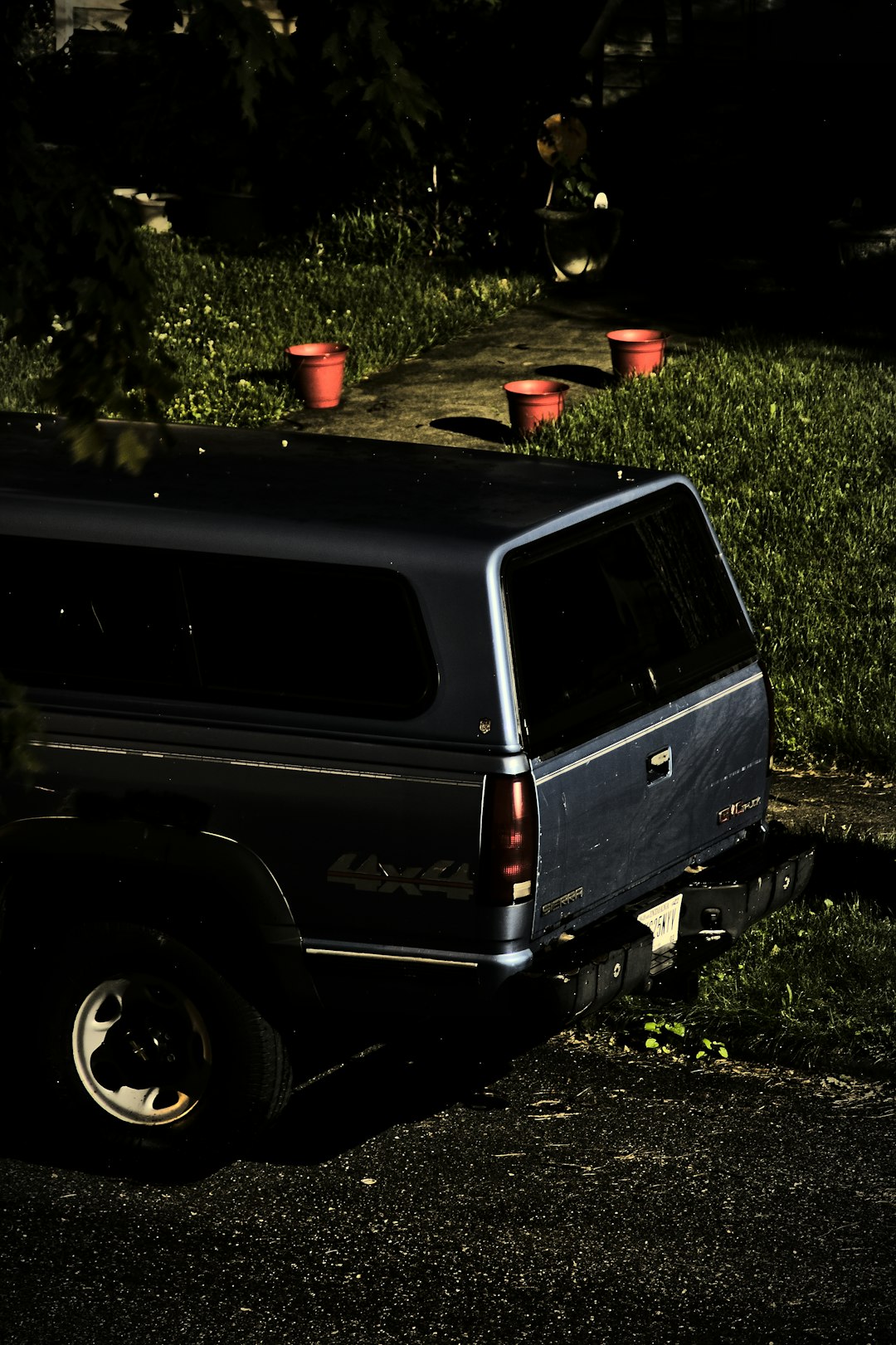 black suv on green grass field during daytime