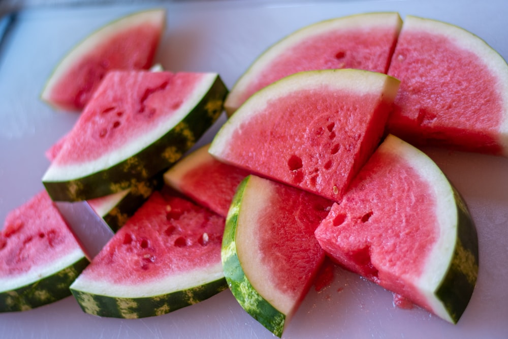 sliced watermelon on white plate