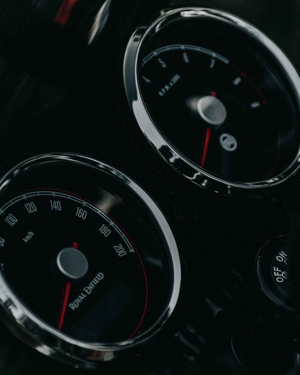 black and white analog speedometer