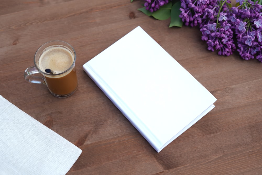 white paper on brown wooden table