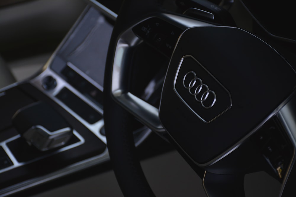 black and silver honda steering wheel