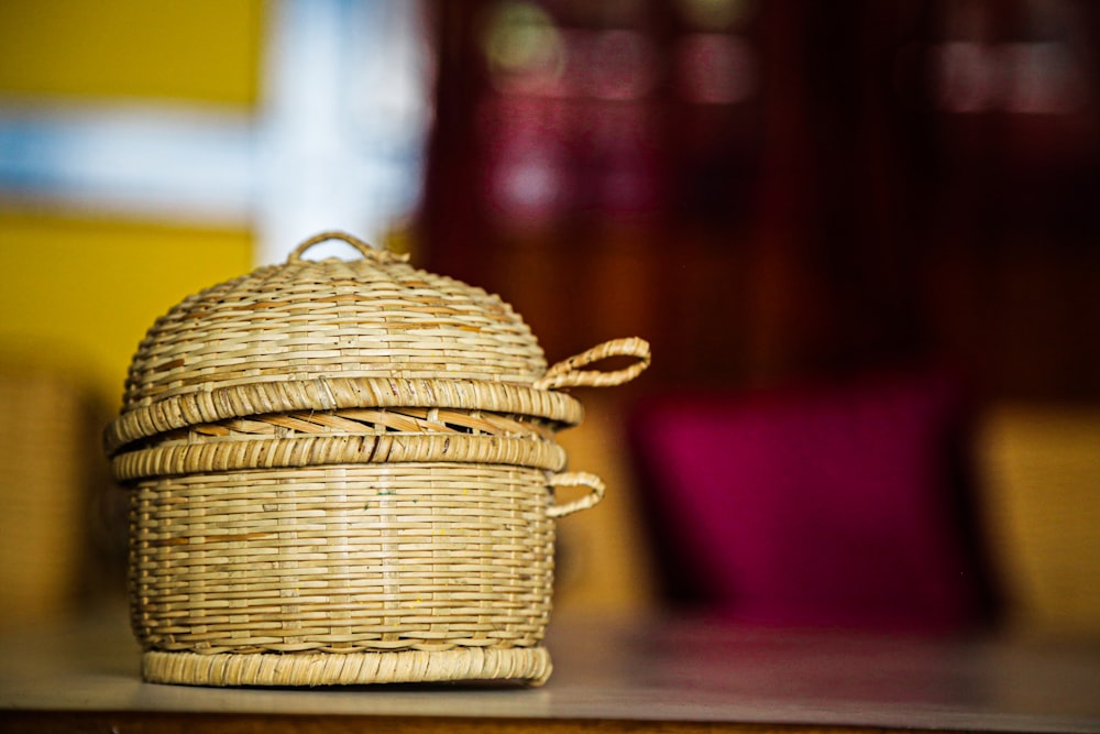 brown woven basket on brown wooden table