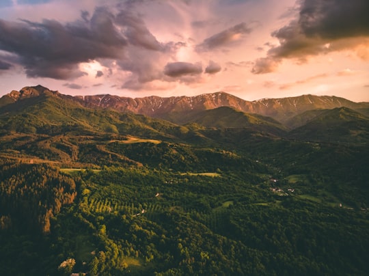 green and brown mountains under cloudy sky during daytime in Apriltsi Bulgaria