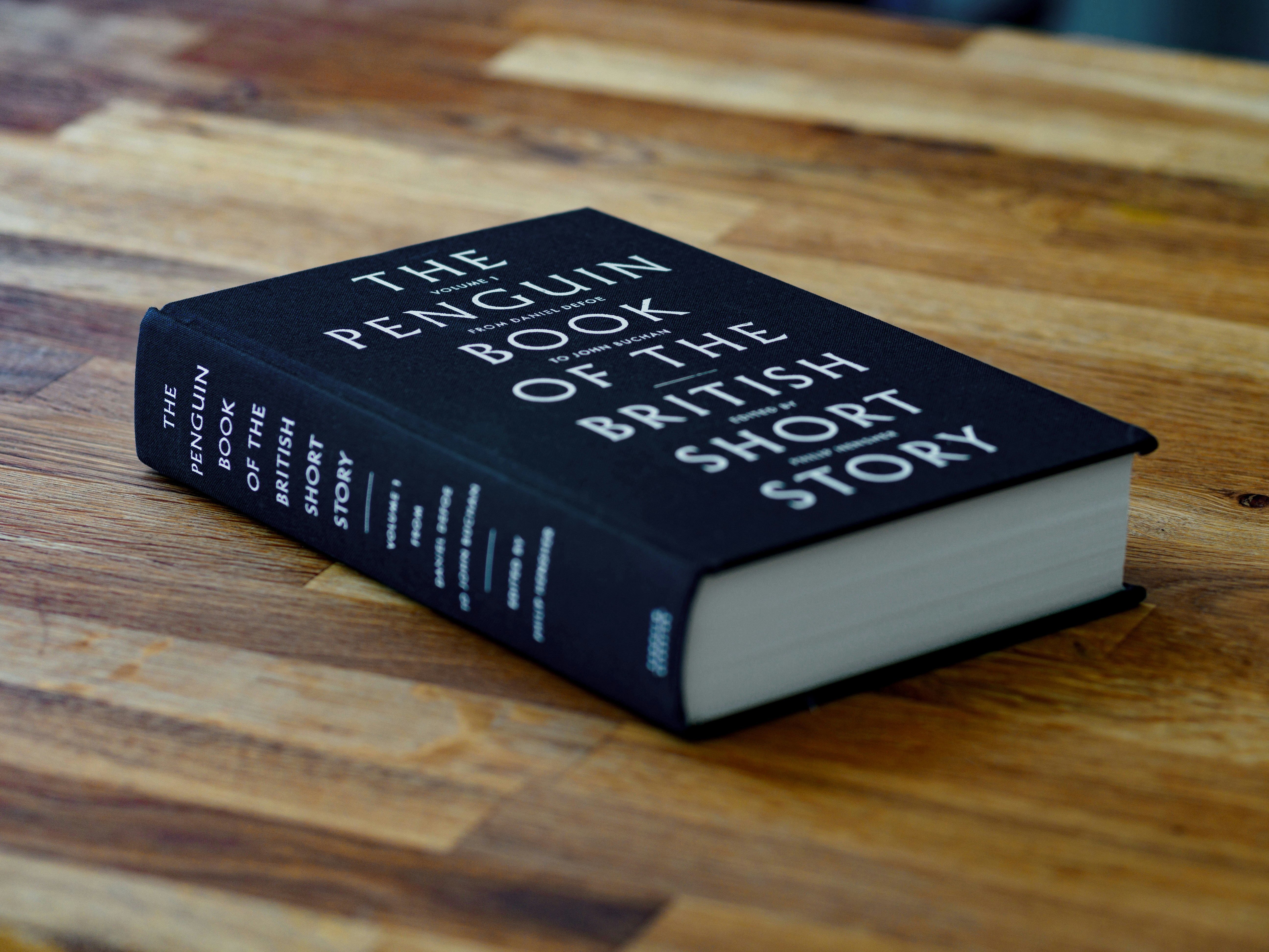 book, product shot, thick book, reading material, reading, literacy, long read, bokeh, close up,