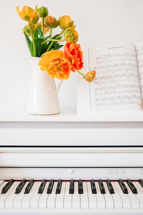 white book page with red and yellow flowers