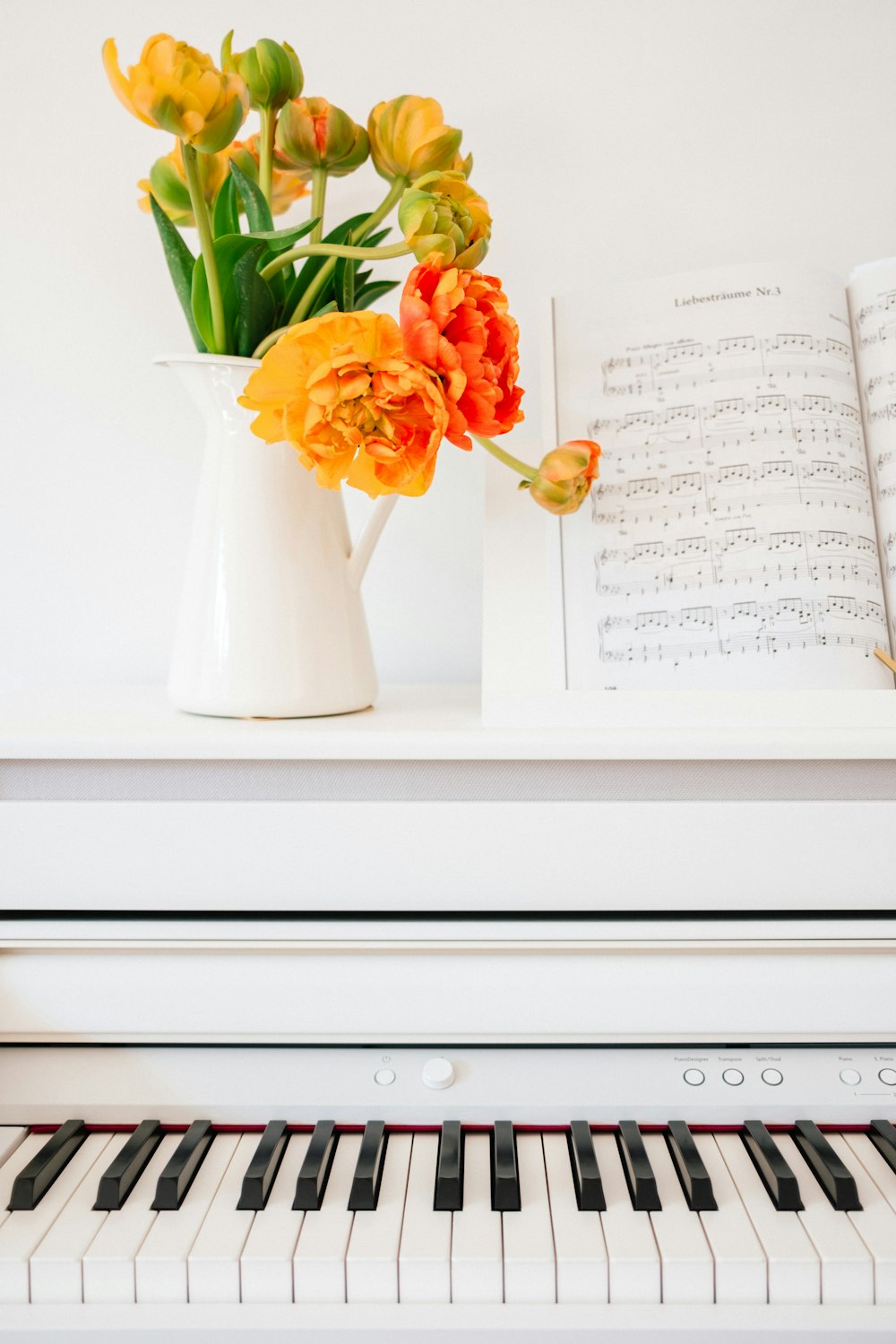 white book page with red and yellow flowers