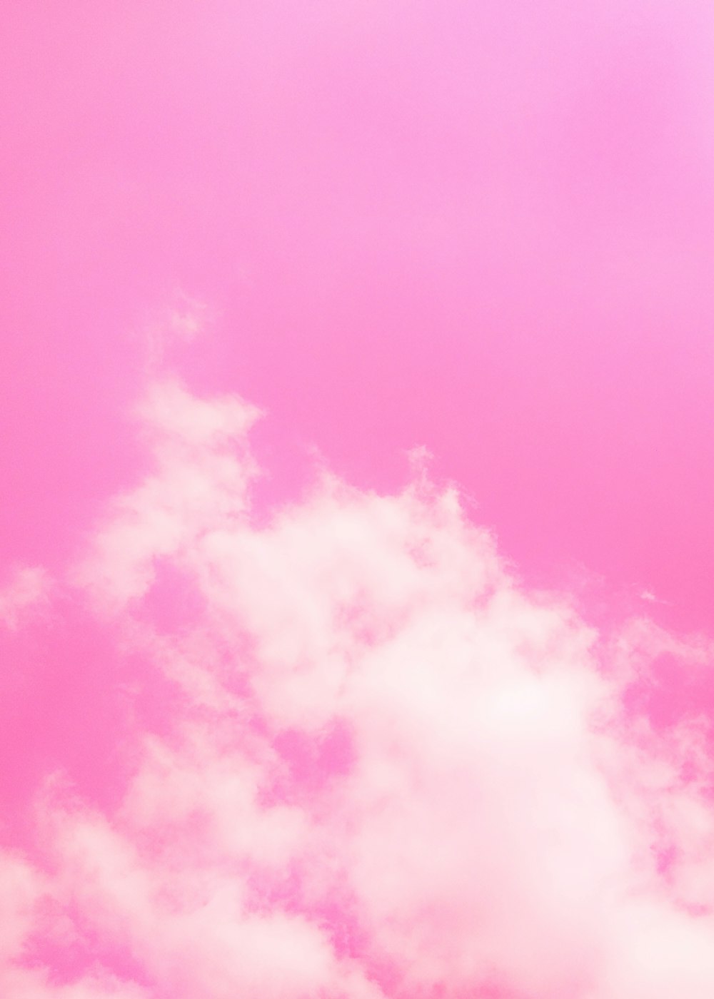 rosa und weiße Wolken tagsüber