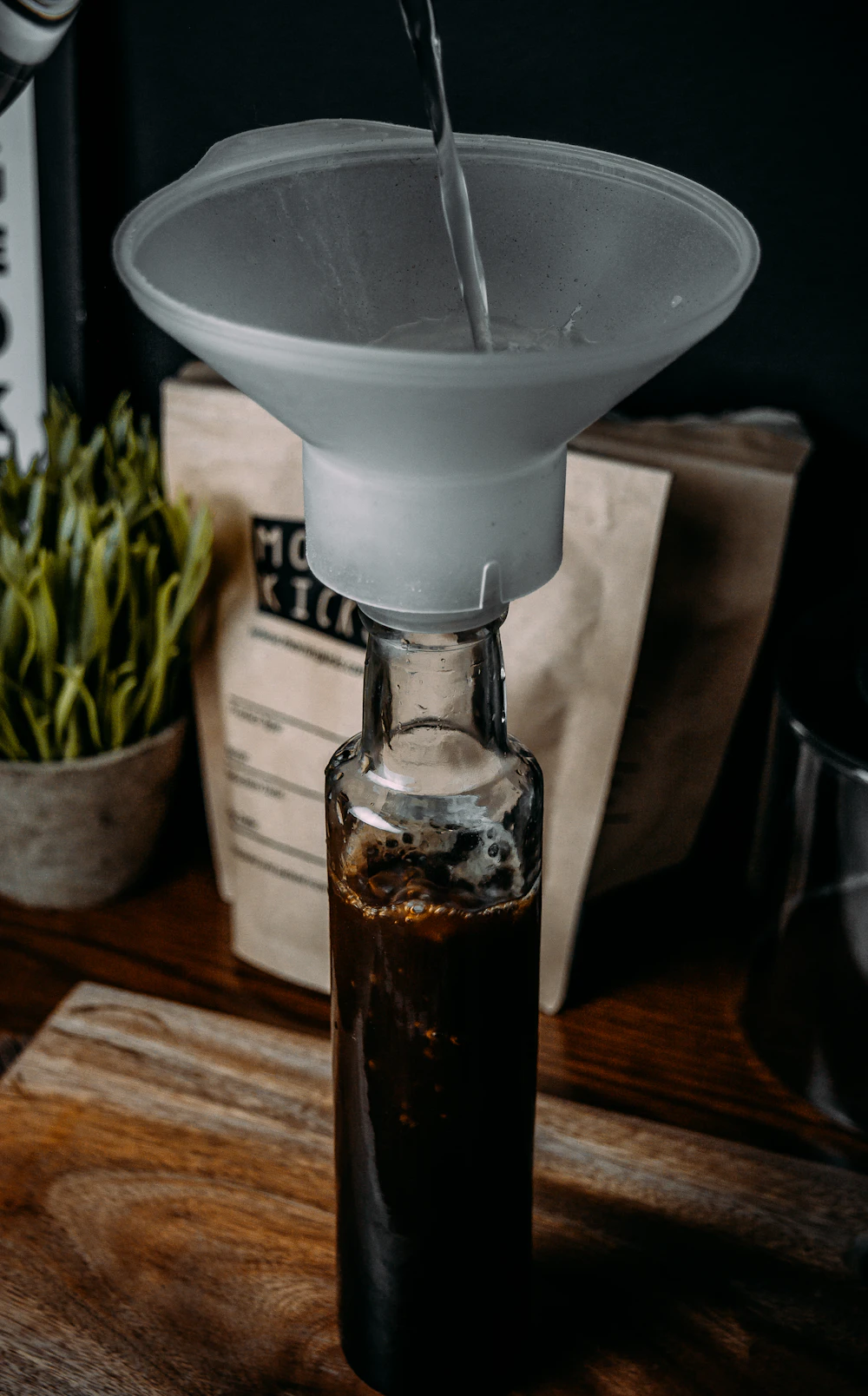 Cold brew coffee extracting slowly into a carafe