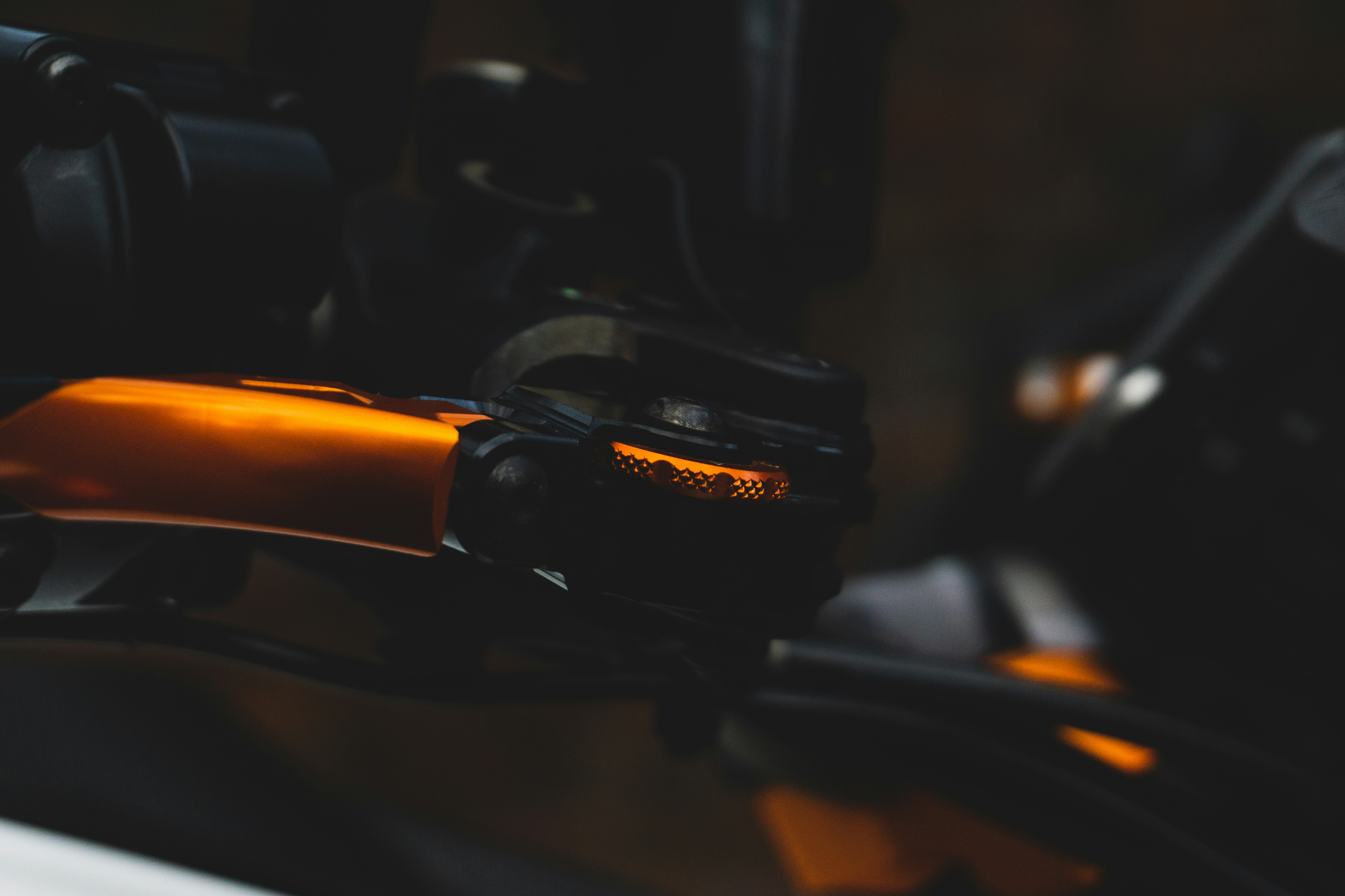 black and orange bicycle handle bar