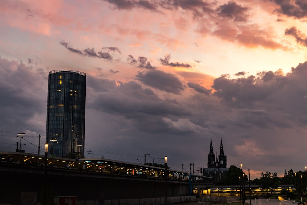 silhouette of city buildings during sunset