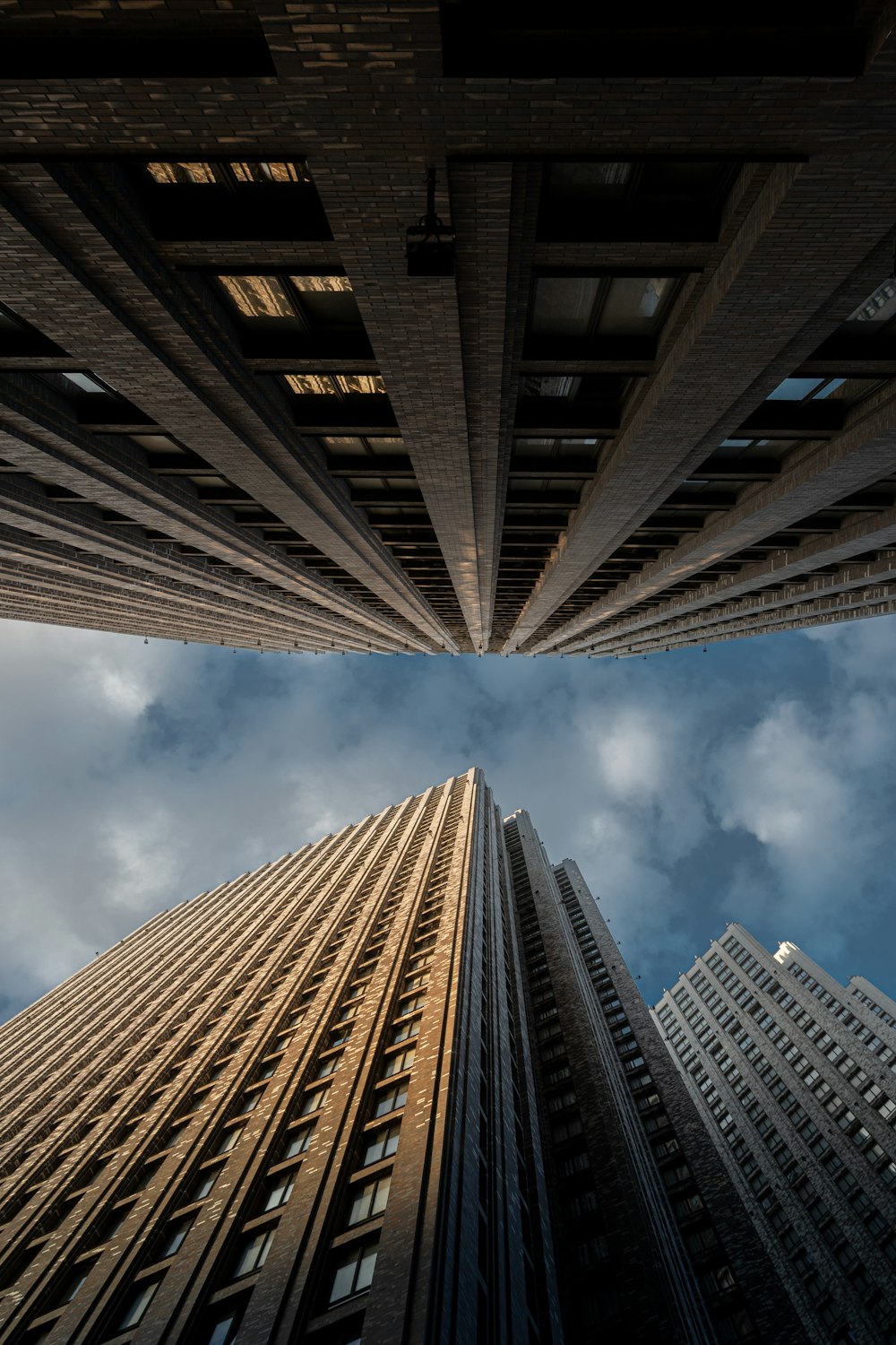 worms eye view of brown building during daytime