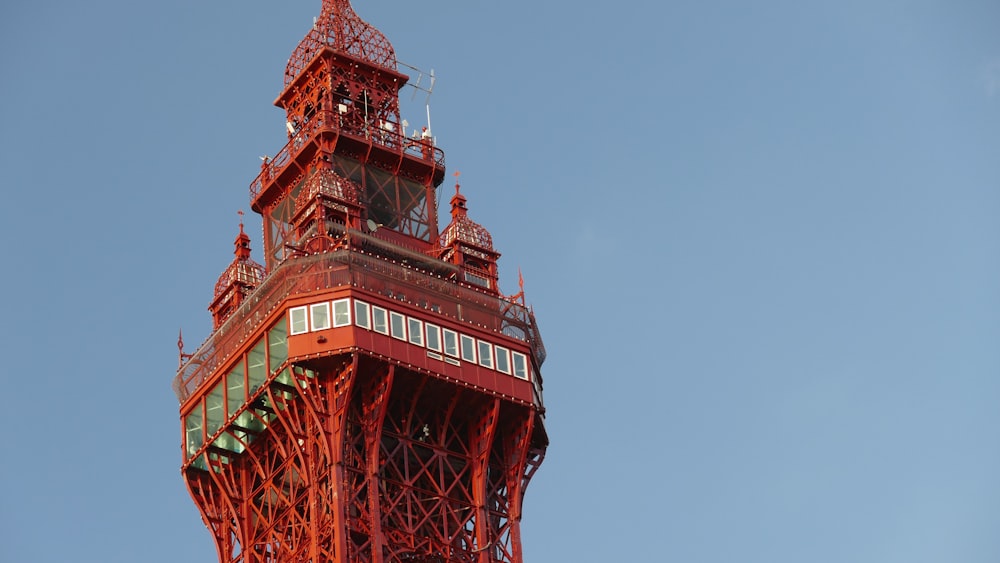 red and white tower under blue sky