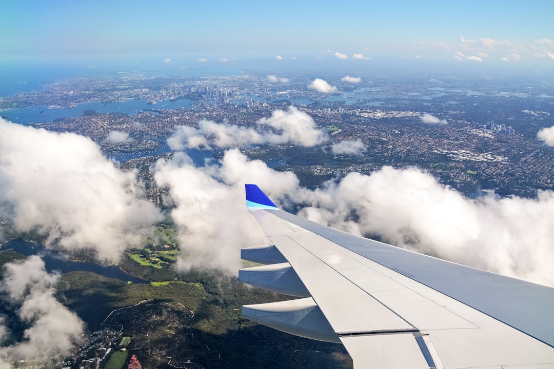 white clouds over green mountains during daytime