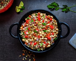 black ceramic bowl with vegetable salad