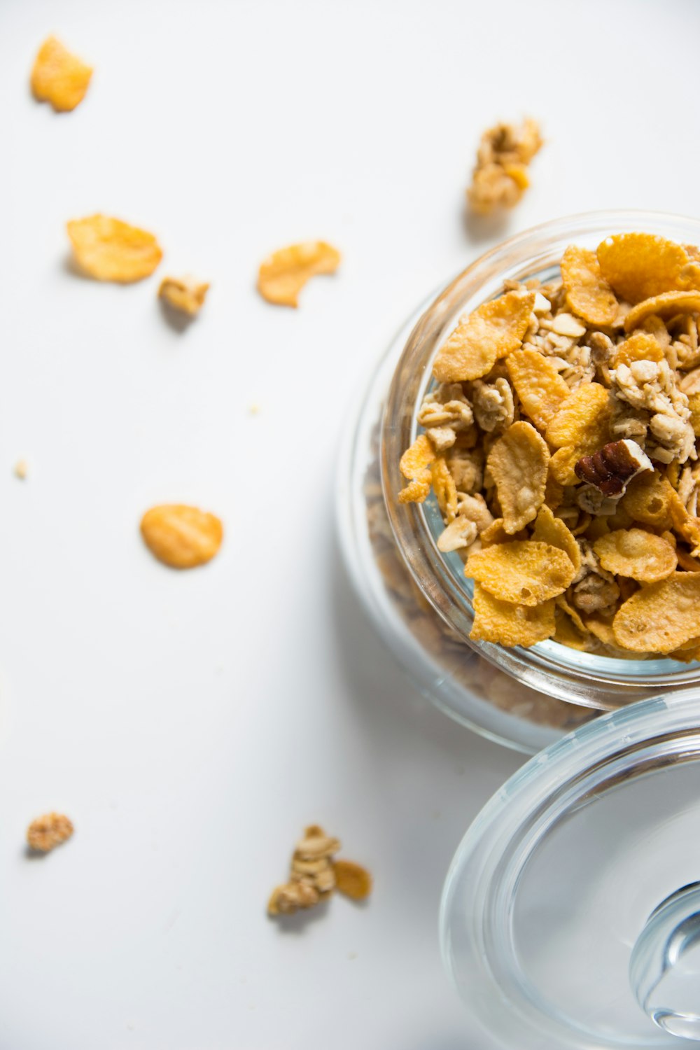 brown peanuts in clear glass jar