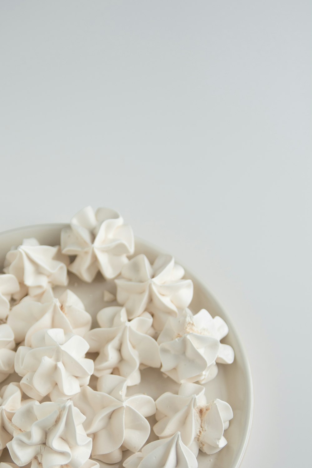 white popcorn on white ceramic bowl