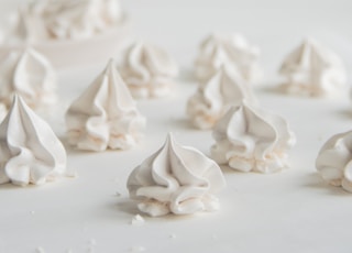 white paper flower petals on white surface