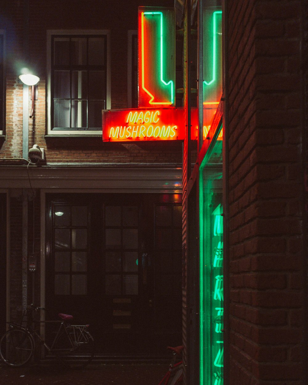 red and white open neon light signage