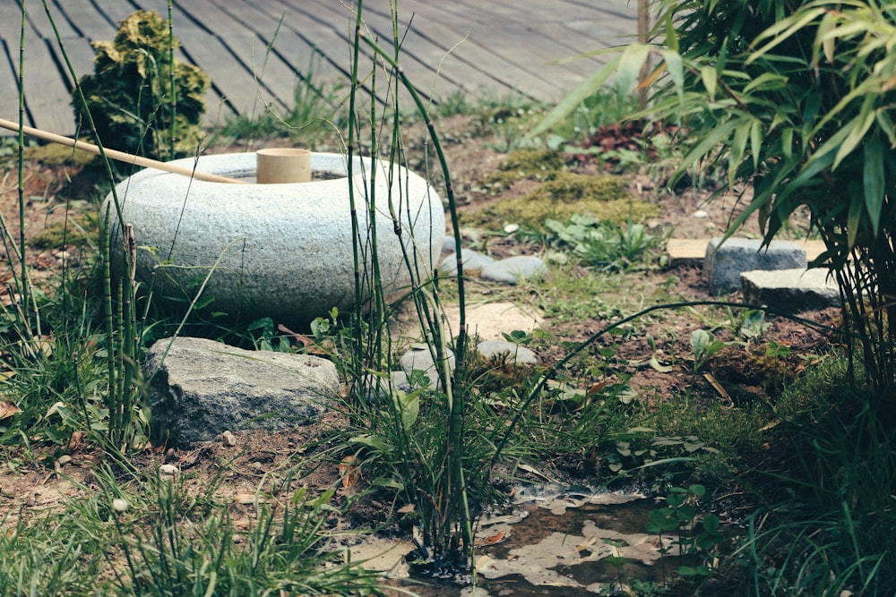 white round concrete outdoor fountain