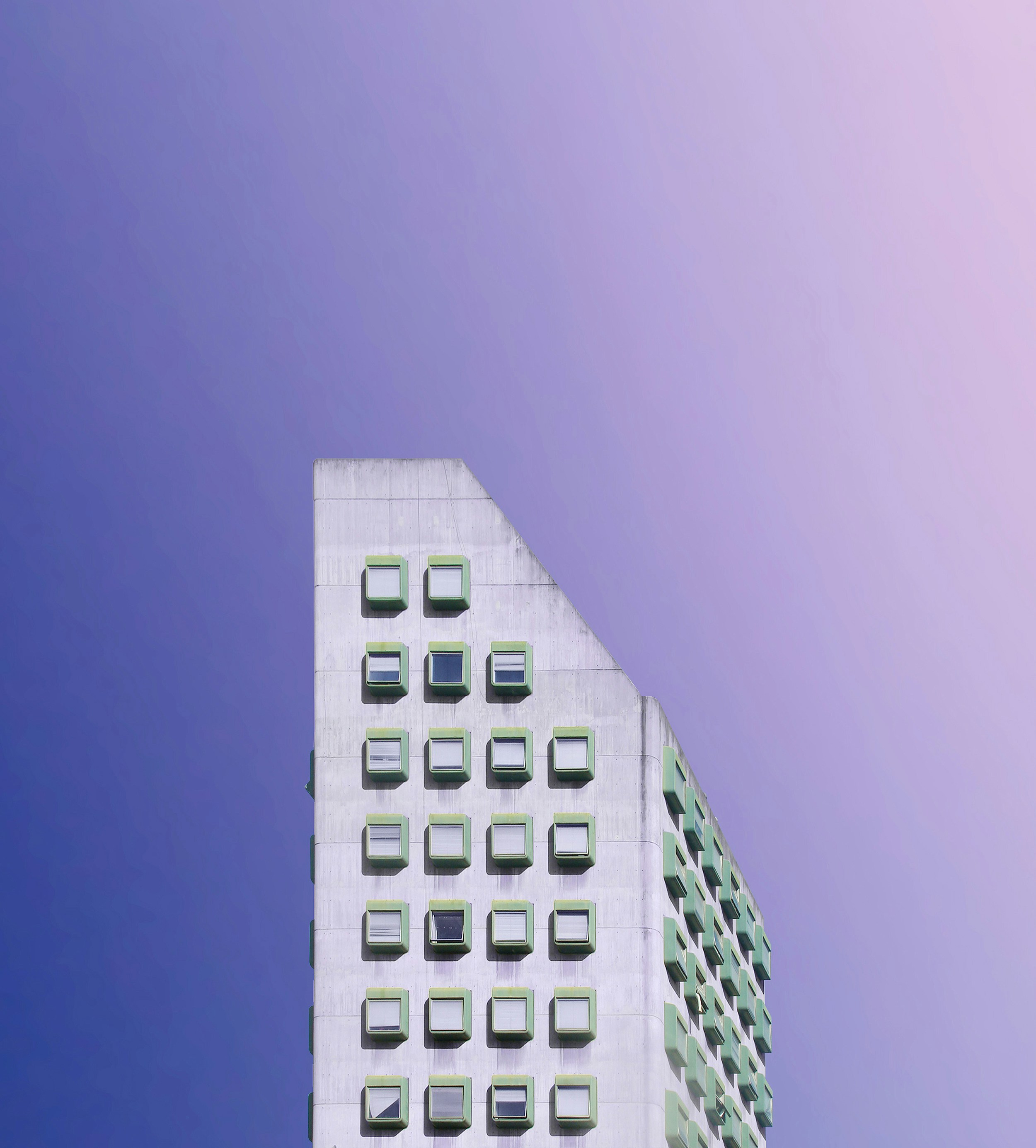 white concrete building under blue sky during daytime