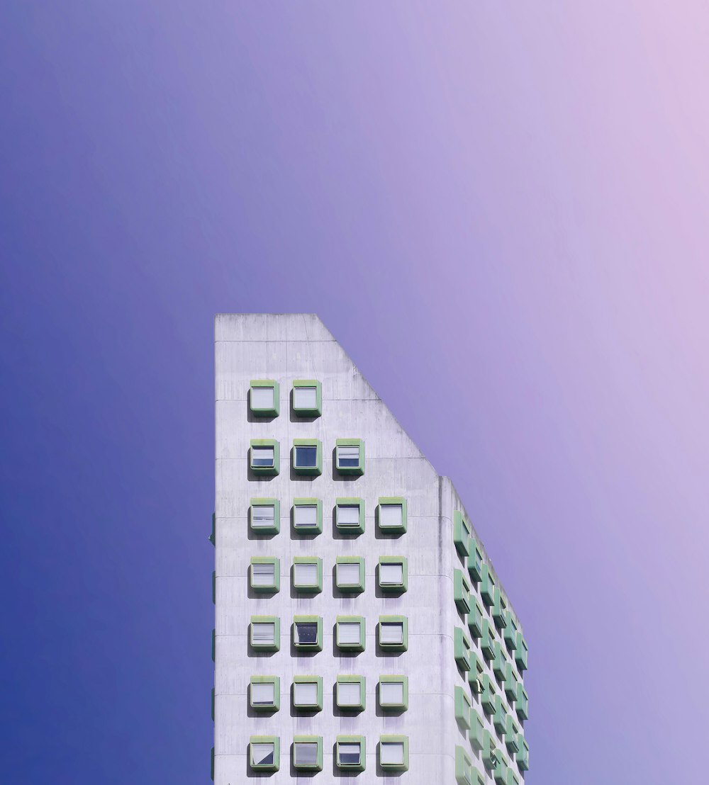 white concrete building under blue sky during daytime