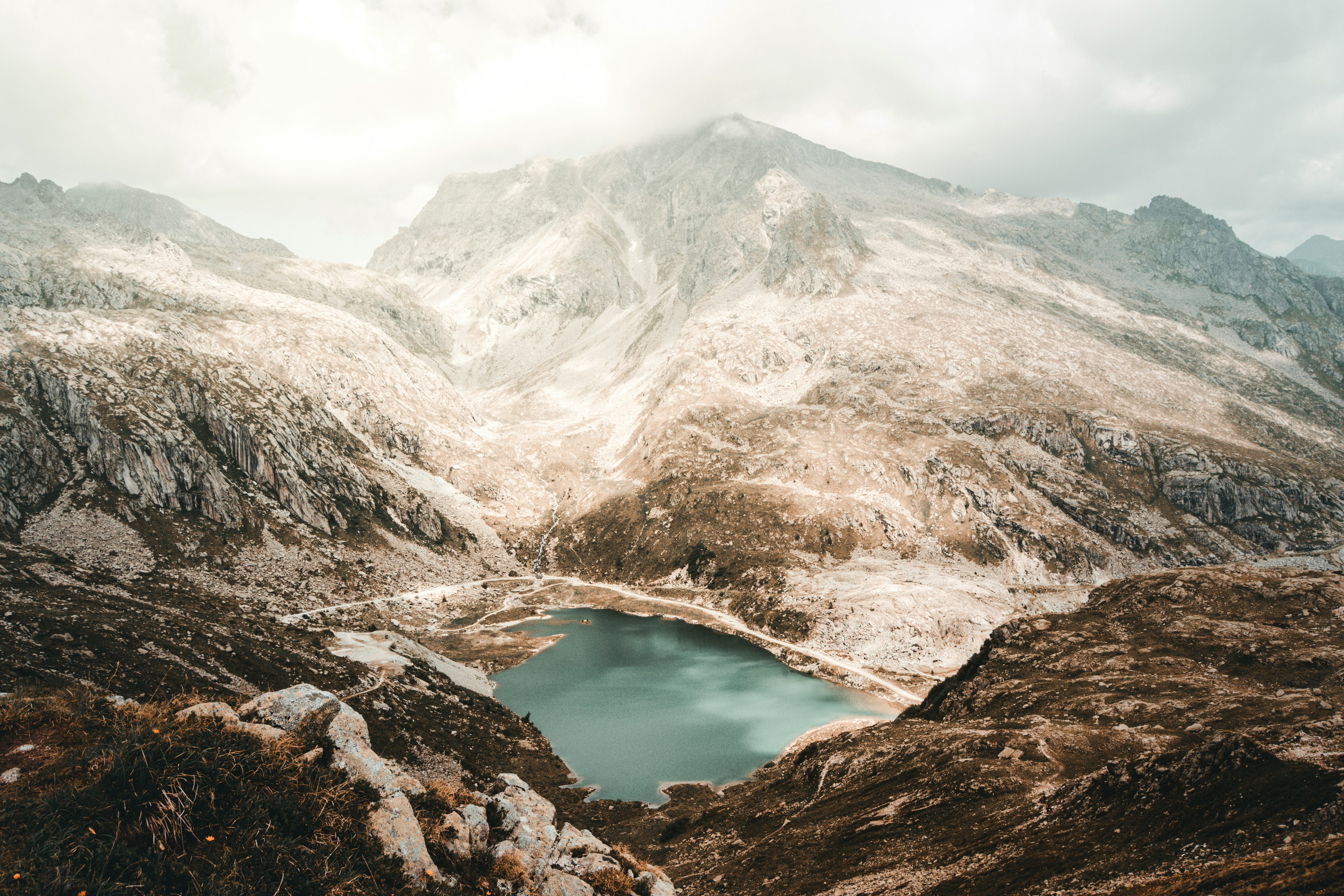 lake in the middle of mountains