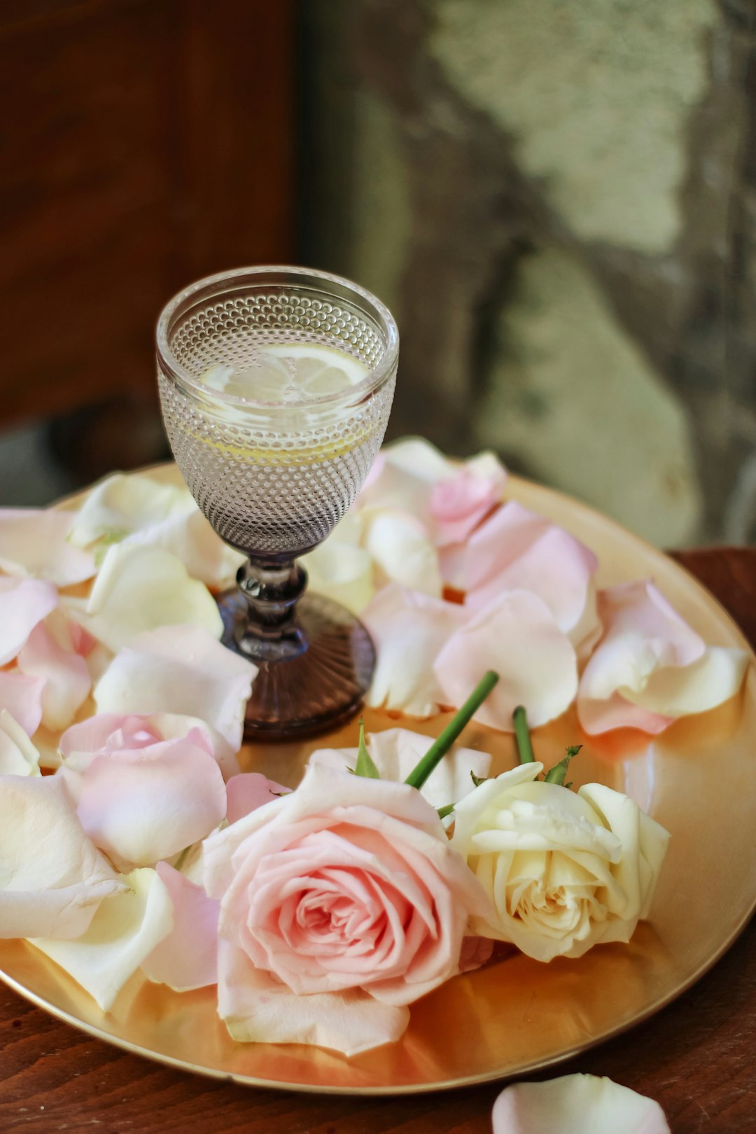 pink roses on clear glass vase