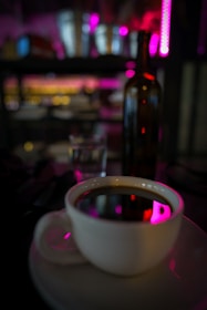 white ceramic teacup on saucer