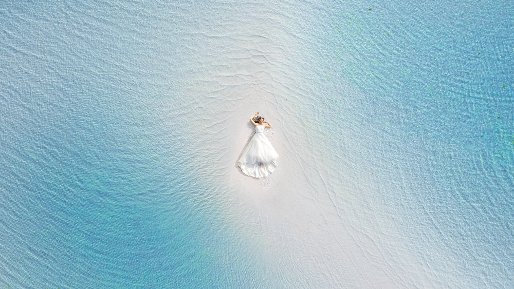 aerial view of white boat on sea during daytime