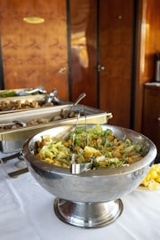 stainless steel bowl with vegetable salad