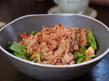 cooked food on stainless steel bowl