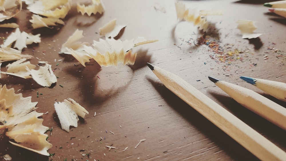 white and brown wooden pencil