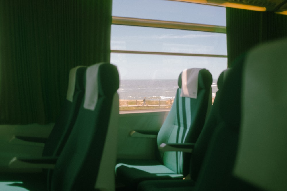 green and white bus seat