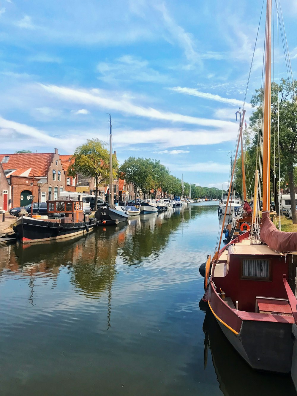 a river filled with lots of boats on top of it