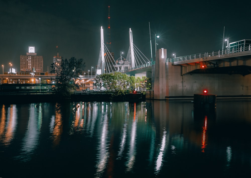 bridge over river during night time