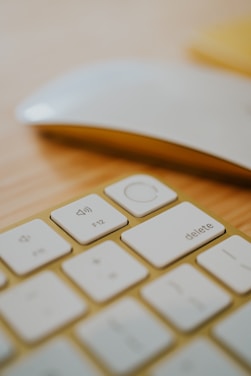 a close up of a keyboard and a mouse