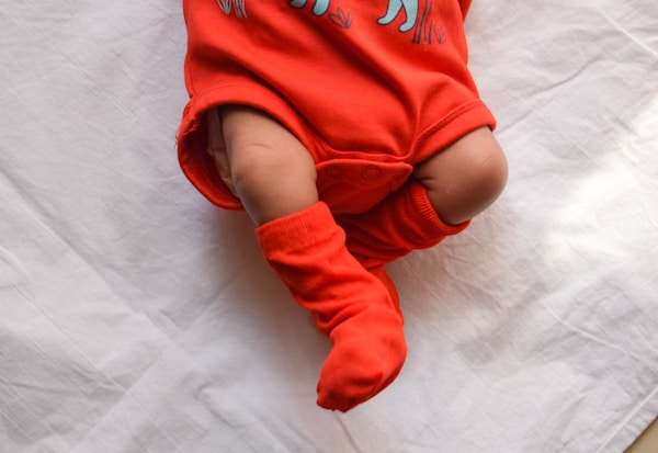 Baby in red onesie