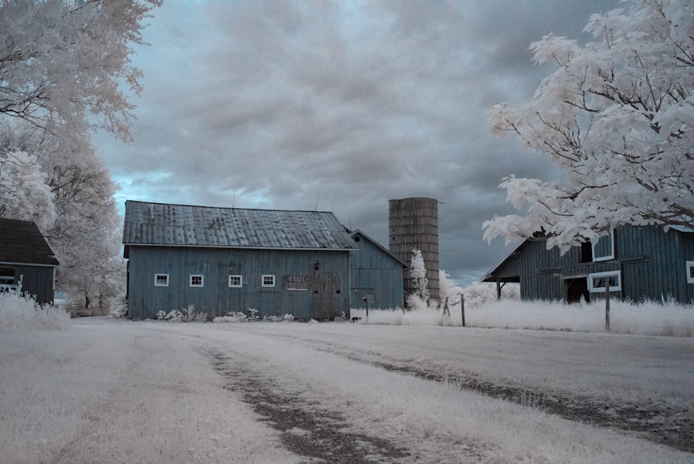 brown wooden house under white clouds during daytime